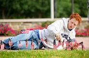 Cooper Creagan '13 puts flags in the ground along Martin's Way