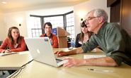 Students listen to Dave Chanatry '80 talk about visual story telling during a student/alumni journalist workshop forum in Sadove Student Center.