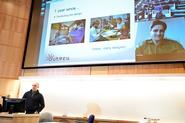 Kevin Bourque '05, left, and Joshua Kunkel '04, on screen, co-founders of Face Glove and winners of the 2012 Hamilton Pitch Competition, give a presentation on preparing for the pitch competition.