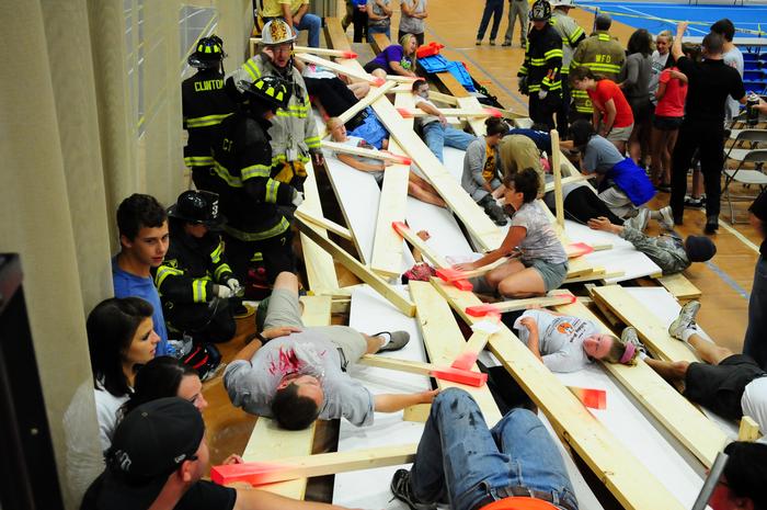 The staged bleacher collapse in the emergency drill. PHOTO: MARIANITA PEASLEE