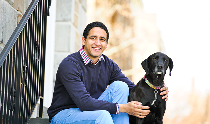 Felipe Garcia '14 and Lily.