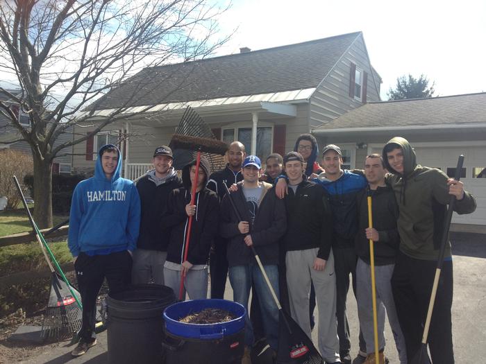 Members of the men's basketball team helped clean some senior citizens' yards in New York Mills on April 20.