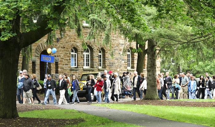 Alumni march across campus during Saturday's Reunion parade. PHOTO: BY NANCY L. FORD