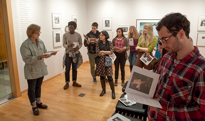 Students meet with Mary Lee Hodgens, associate director of Light Work in Syracuse.