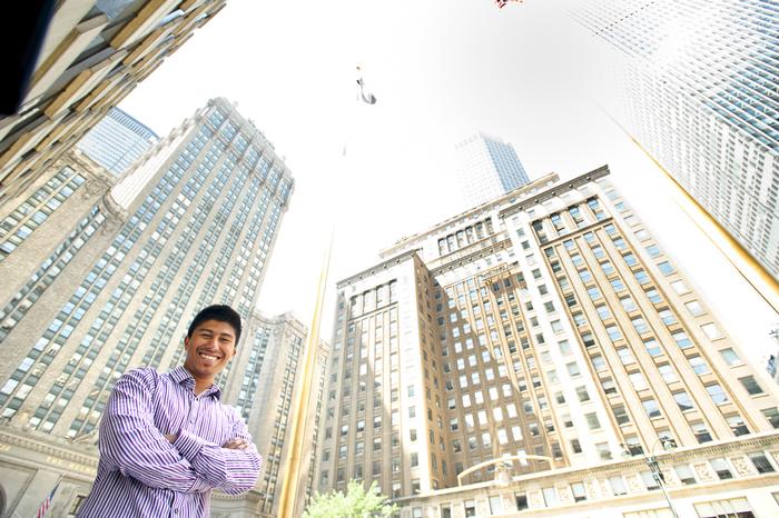 Ujjwal Pradhan '15 poses outside of his internship at Priority Capital Management.
