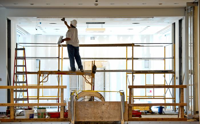 Construction workers busy themselves in the new Wellin Museum of Art last week.