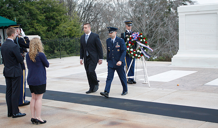 From left Chris Holm '15 and Tracy Mazzerole '15 (backs to camera), Vincent Di Cindio '15 and Lt. Colonel Eric R. Hannis ’90.