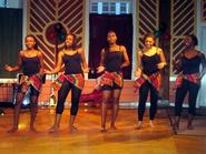 Students Performing a Traditional African Dance at a Black History Month Celebration.