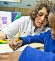 Alex Ossola '10 with a City Year student