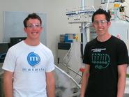 Alex Thompson '13, left, and Genentech research associate, Malcolm Huestis.
