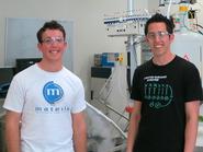 Alex Thompson '13, left, and Genentech research associate, Malcolm Huestis. 