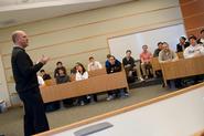 Rich Bernstein '80 addresses Hamilton economics classes.