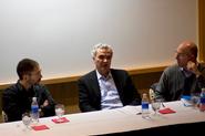 Prof. Julio Videras, Bob Fryklund '80 and Richard Bernstein '80 at the panel discussion.