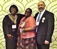 Phyllis Breland '80 with Doris Waiters from the New York State Education Department and William Short, HEOP director at St. Lawrence University, at the TSC awards presentation.