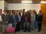 Sen. Ray Meier, center, with current and former ACCESS students.
