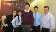 Alumni at Hartford Financial who welcomed Daniel Tempest '13 (center) included, from left, Courtney Mocio '07, Sandra Revueltas '05, David Chen '06 and Steve Prymas '96. 