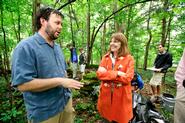 Nathan Goodale speaks with Joan Stewart as students begin excavation. Photo by Nancy Ford.