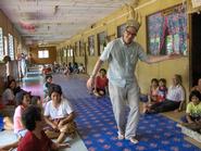 Latrell performs in Malaysia during one of his research trips.