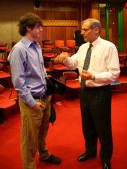 John Hewko talks to a student after his lecture. Photo by Melissa Balding.