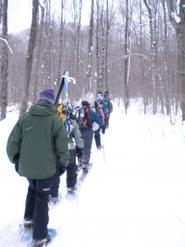 GNAR Club members climb Equinox Mountain in Vermont.