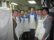 Men's lacrosse team members at the Utica Rescue Mission on Feb. 6