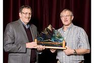 Maurice Isserman (left) accepting award from Mike Mortimer at Banff