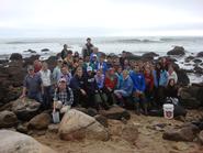 Marine biology classes in Weekapaug, R.I., with Hurricane Kyle’s waves in the background.