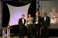 Martin Hirsch '60 (right center) with Maxwell Finland Award.