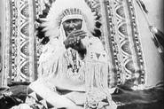 In a film of the “Indian Sign Language Council of 1930” made by the U.S. Department of the Interior, Mountain Chief, a Piegan signer of Plains Indian Sign Language tells a story of buffalo being driven over a bluff.