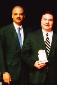 Michael Quinn '80 and Attorney-General Eric Holder