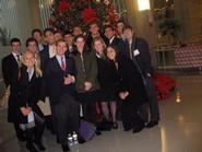 Students in Washington Program at the international Christmas tree in the atrium of the World Bank.