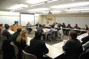 Charter Trustees Bob Delaney '79 and John Rice '78 talk with Chinese concentrators.