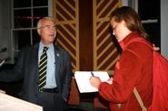 Dr. James Cobey '65 talks with Elizabeth Parker-Magyar '12.