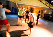 From left: Jessica McBeck '12, Claire Zurlo ’14 and Grace Belkot '12 dance during the marathon to benefit Clinton ABC House.