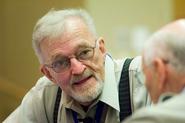 Doug Chapman '58 chats with Bob Boyle at the Alumni College.