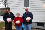 Terry Hawkridge and Norm Bramley from Physical Plant and Jeanne Roback from the Country Pantry (center).