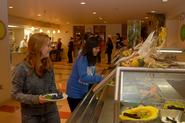 Students select from many locally grown items at the salad bar in Soper Commons.