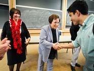 Nobel Laureate Shirin Ebadi greets a student after her classroom discussion.