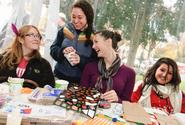 Students helped youngsters create trick or treat bags.