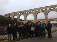 Hamilton students in France at the Pont du Gard, an ancient Roman aqueduct bridge that crosses the Gardon river. 