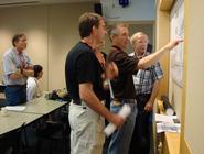 Eugene Domack, (center, pointing) explains results from IRMS.