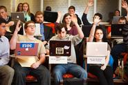 As members of the Senate, students vote on a bill during Prof. Andy Milstein's Senate simulation.