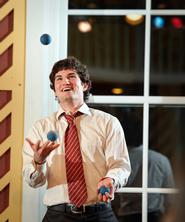 Hockey player Joe Rausch '15 shows off his talent to potential bidders.