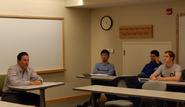 Jeff Schackner '89 addresses Erol Balkan's economics class.