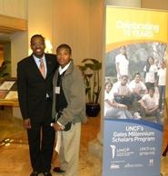 Wlajimir Alexis '13, right, with Larry Griffith, vice president of the United Negro College Fund and Gates Millennium Scholar program.