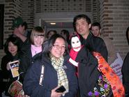 Kelsey Brow '12 and Celia Yu '12 with serpent demon puppet.
