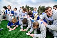 The men's lacrosse team participates in STOP Day