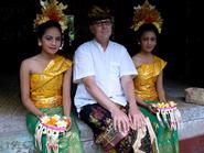 Professor of Theatre Craig Latrell and two dancers, at the wedding of a Ukranian couple in Ubud, Bali. 