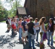 Students from the class of 2012 line up to enter the Kirkland Cottage