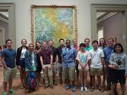 NYC Program students pose in front of Monet's 